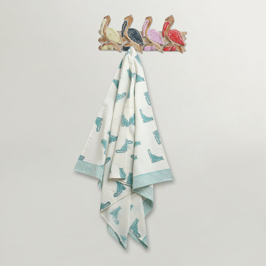 'A Leap of Snow Leopards' Bathing Towel