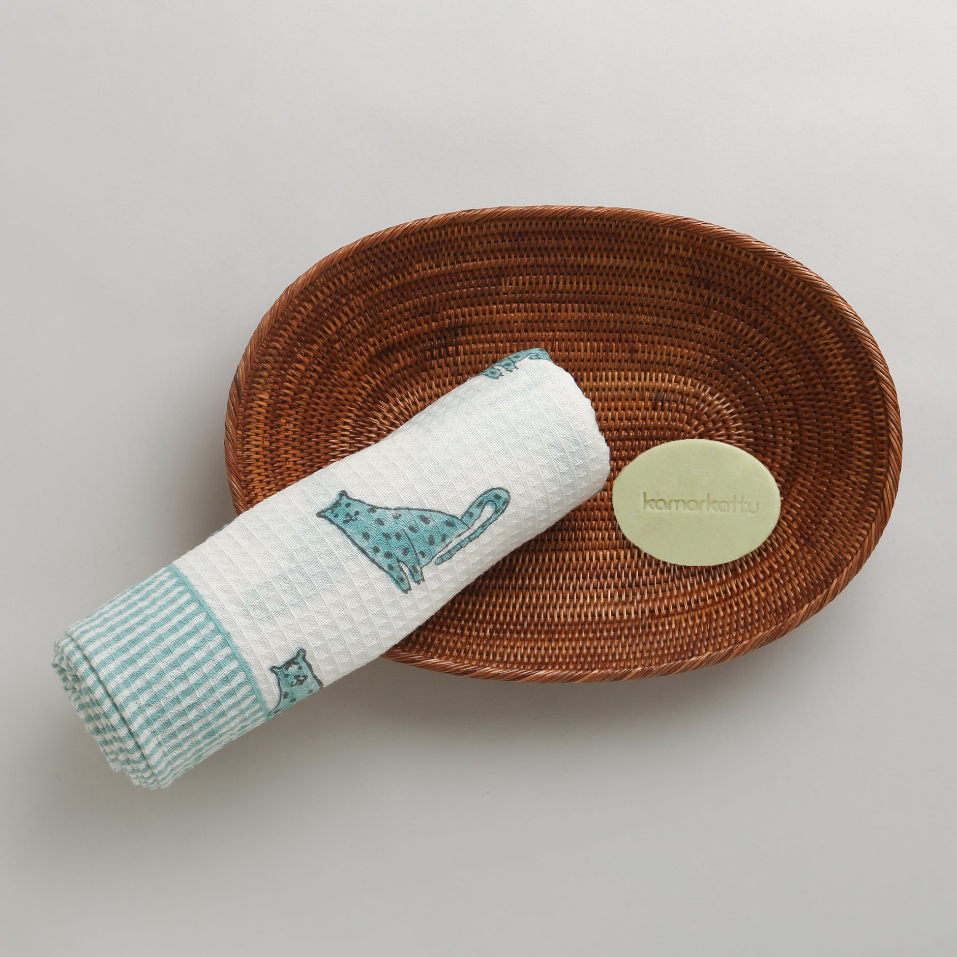 'A Leap of Snow Leopards' Bathing Towel